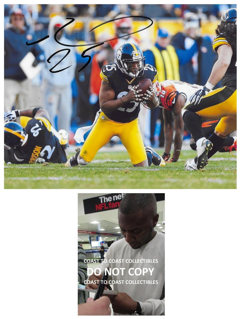 Ryan Clark signed Pittsburgh Steelers football 8x10 photo Proof COA autographed.
