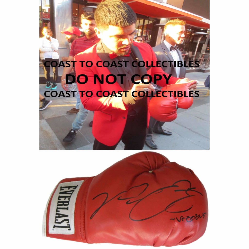 Victor Ortiz, WBC Boxing Champ, Signed, Autographed, Everlast Boxing Glove,The Glove Comes with a COA and Proof Photo of Victor Signing the Glove