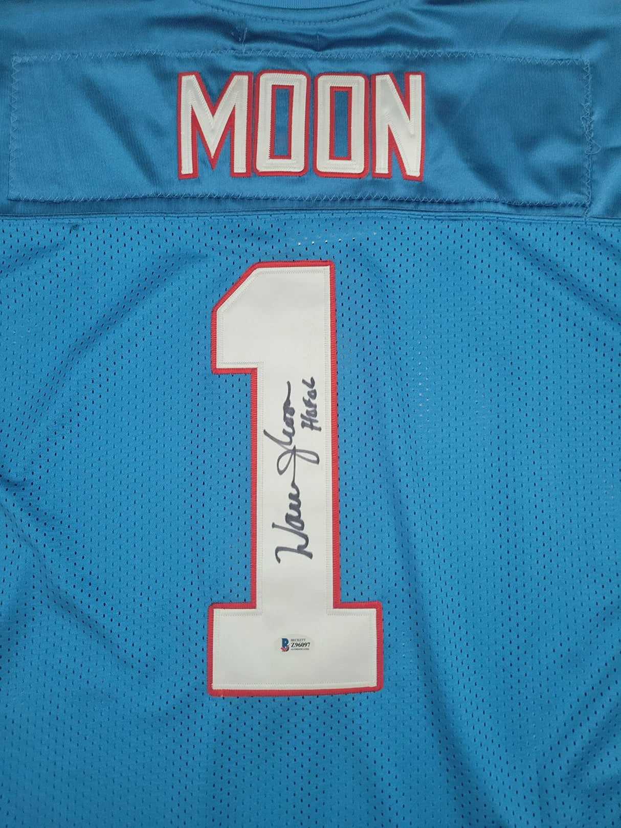 Warren Moon signed Houston Oilers football jersey proof Beckett COA autographed