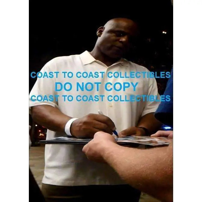 Warren Moon, Houston Oilers, Hall of Fame, Signed, Autographed, 8X10 Photo, a COA with the Proof Photo of Warren Signing Will Be Included.