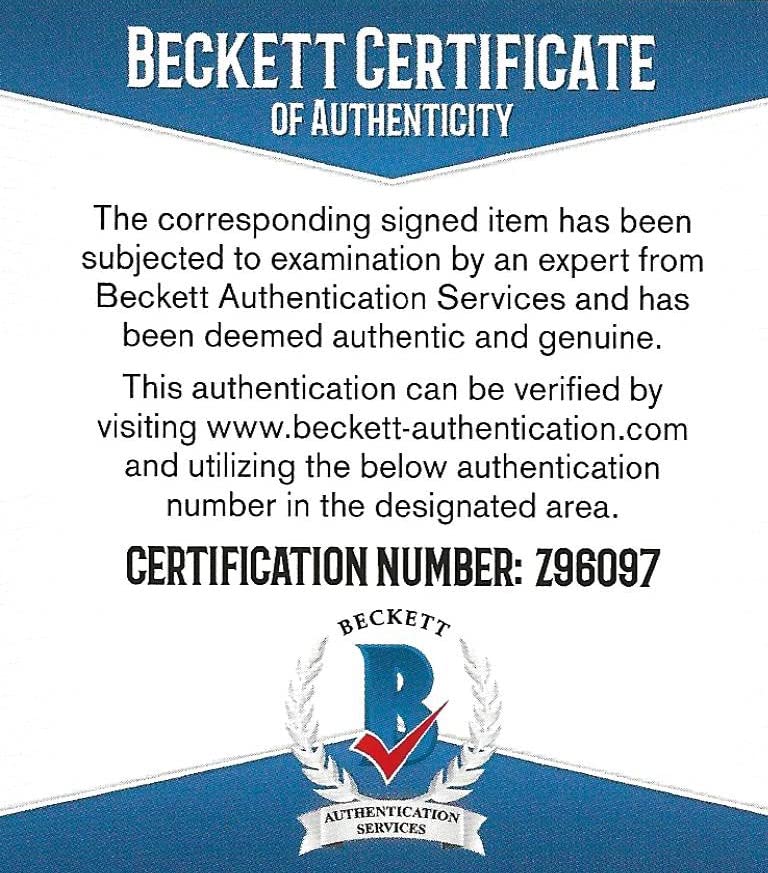 Warren Moon signed Houston Oilers football jersey proof Beckett COA autographed