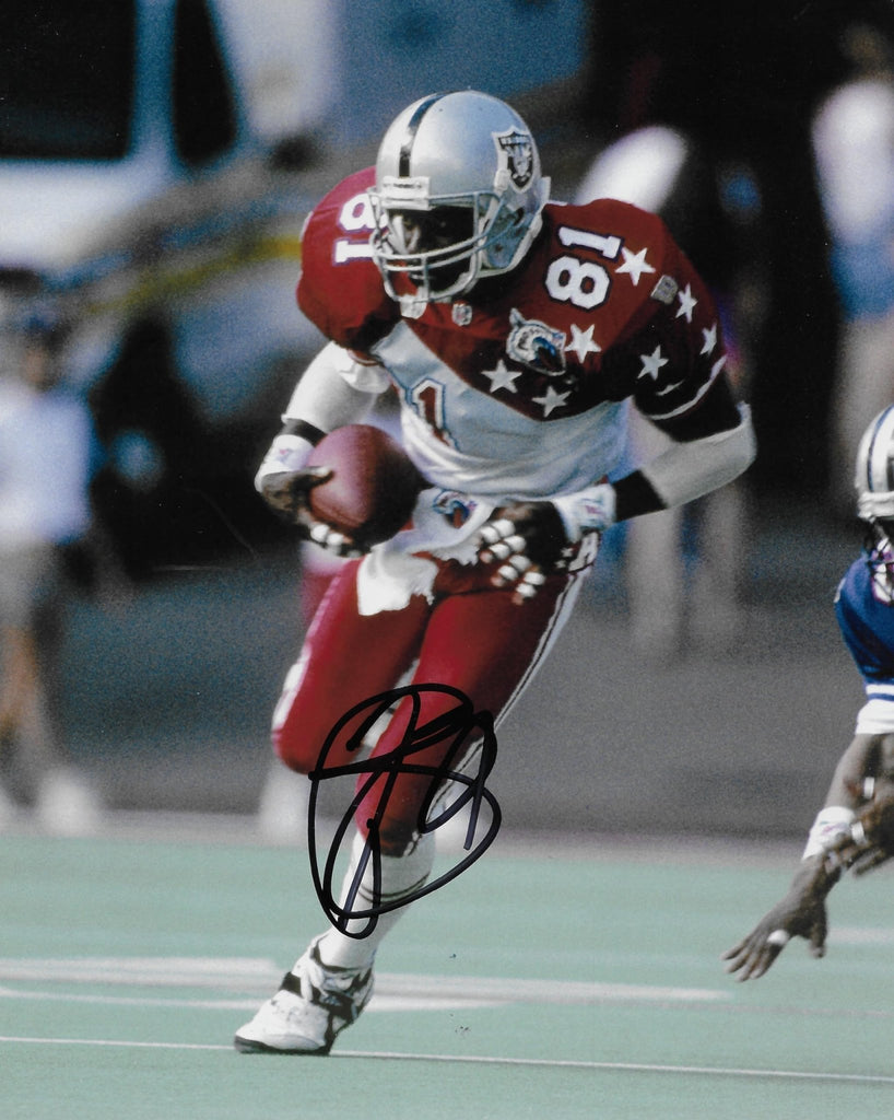 Tim Brown signed Oakland Raiders football 8x10 photo Proof COA autographed LA,
