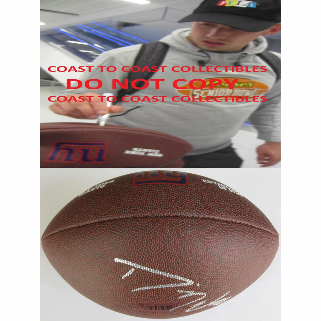 Davis Webb, New York Giants, Signed, Autographed, NFL Logo Football, a COA with the Proof Photo of Davis Signing the Football Will Be Included