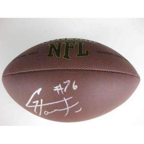 Greg Hardy, Dallas Cowboys, Carolina Panthers, Signed, Autographed, NFL Football, a COA with the Proof Photo of Greg Signing the Football Will Be Included
