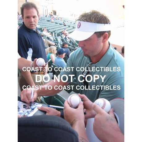 Roger Clemens, New York Yankees, Signed, Authographed, 8X10 Photo, a Coa with the Proof Photo of Roger Signing Will Be Included