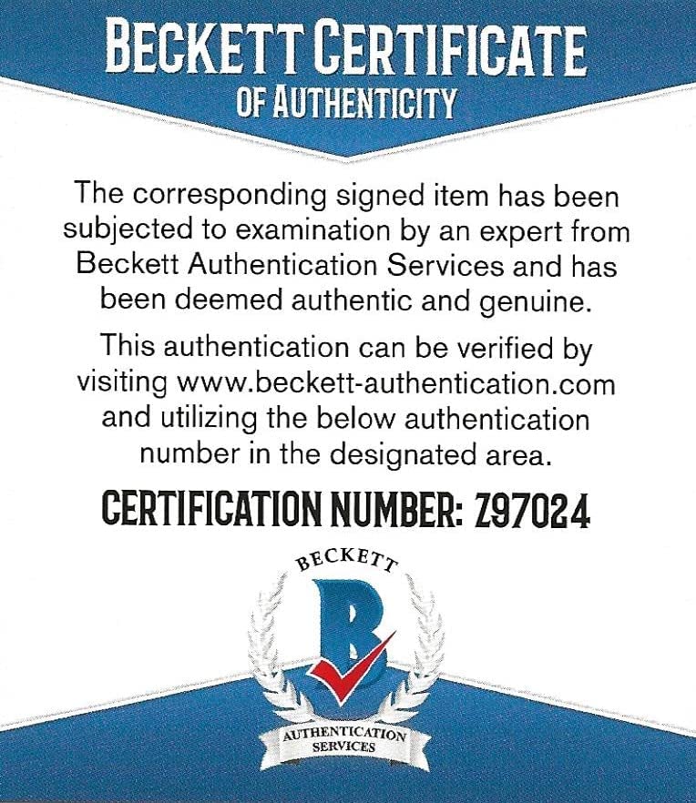 Devan Dubnyk signed Minnesota Wild logo Hockey puck proof Beckett COA autographed