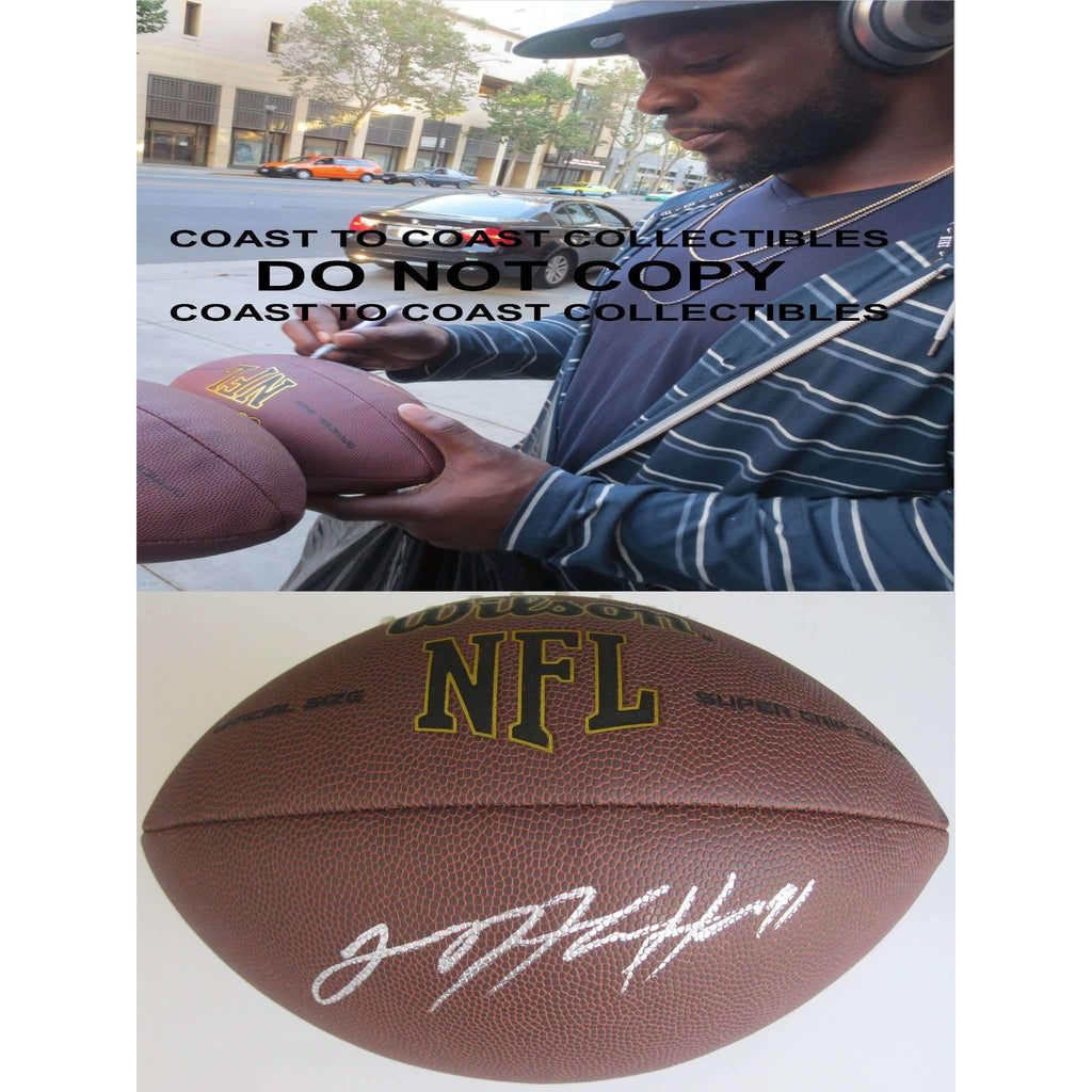 Lamarr Houston, Chicago Bears, Oakland Raiders, Texas Longhorns, Signed, Autographed, NFL Football, a COA with the Proof Photo of Lamarr Signing the Football Will Be Included