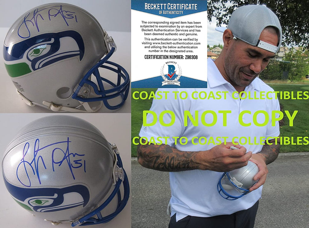 Lofa Tatupu signed autographed Seahawks mini football helmet proof Beckett COA