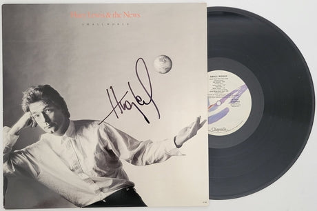 Huey Lewis signed Small World album COA exact proof autographed Vinyl Record STAR