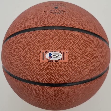 Jim Calhoun UConn Huskies Saint Joseph signed autographed NCAA basketball proof Beckett COA