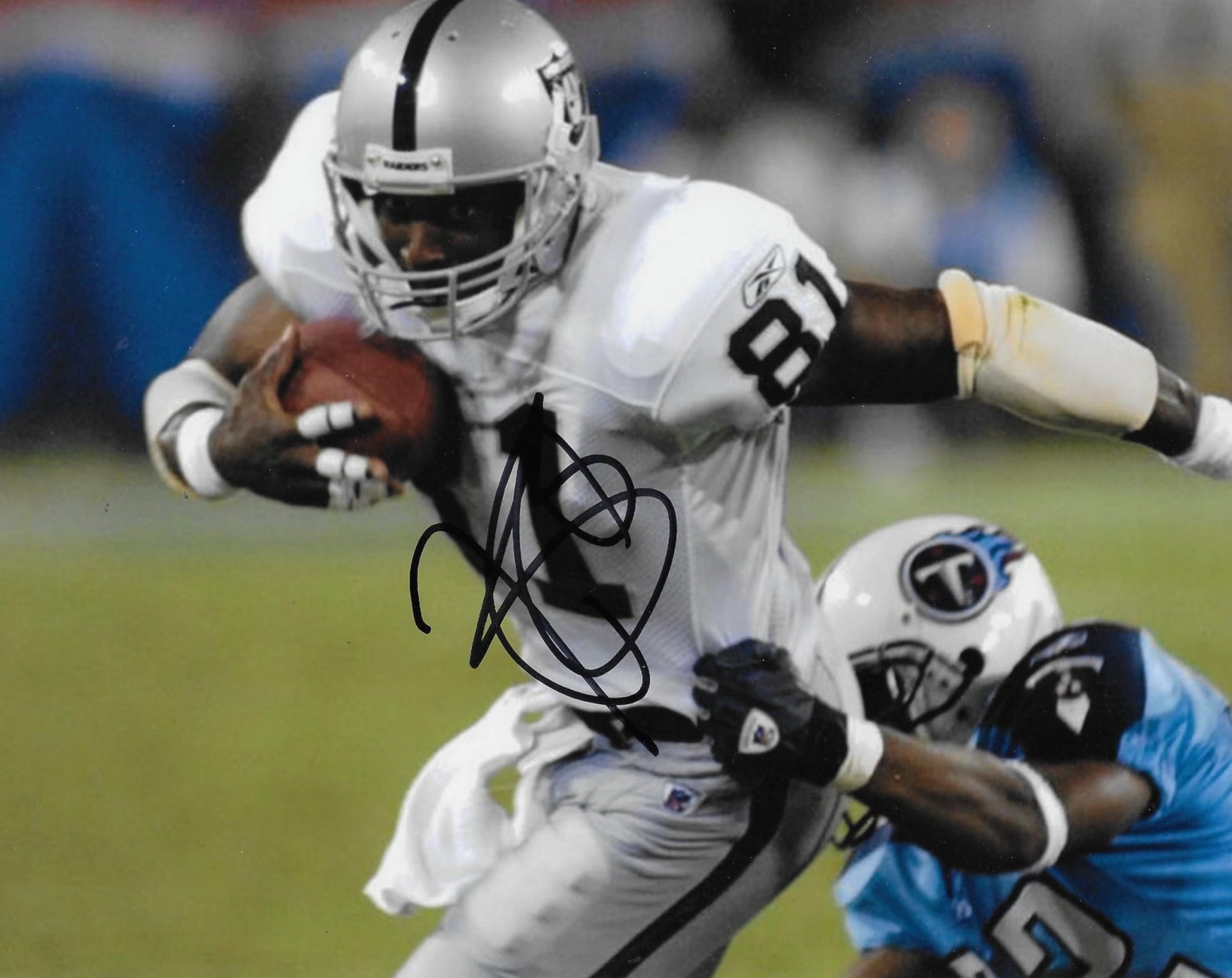 Tim Brown signed Oakland Raiders football 8x10 photo Proof COA autographed LA