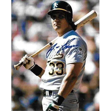 Jose Canseco, Oakland A's, Signed, Autographed, 8X10 Photo, a COA With The Proof Photo of Jose Signing Will Be Included.