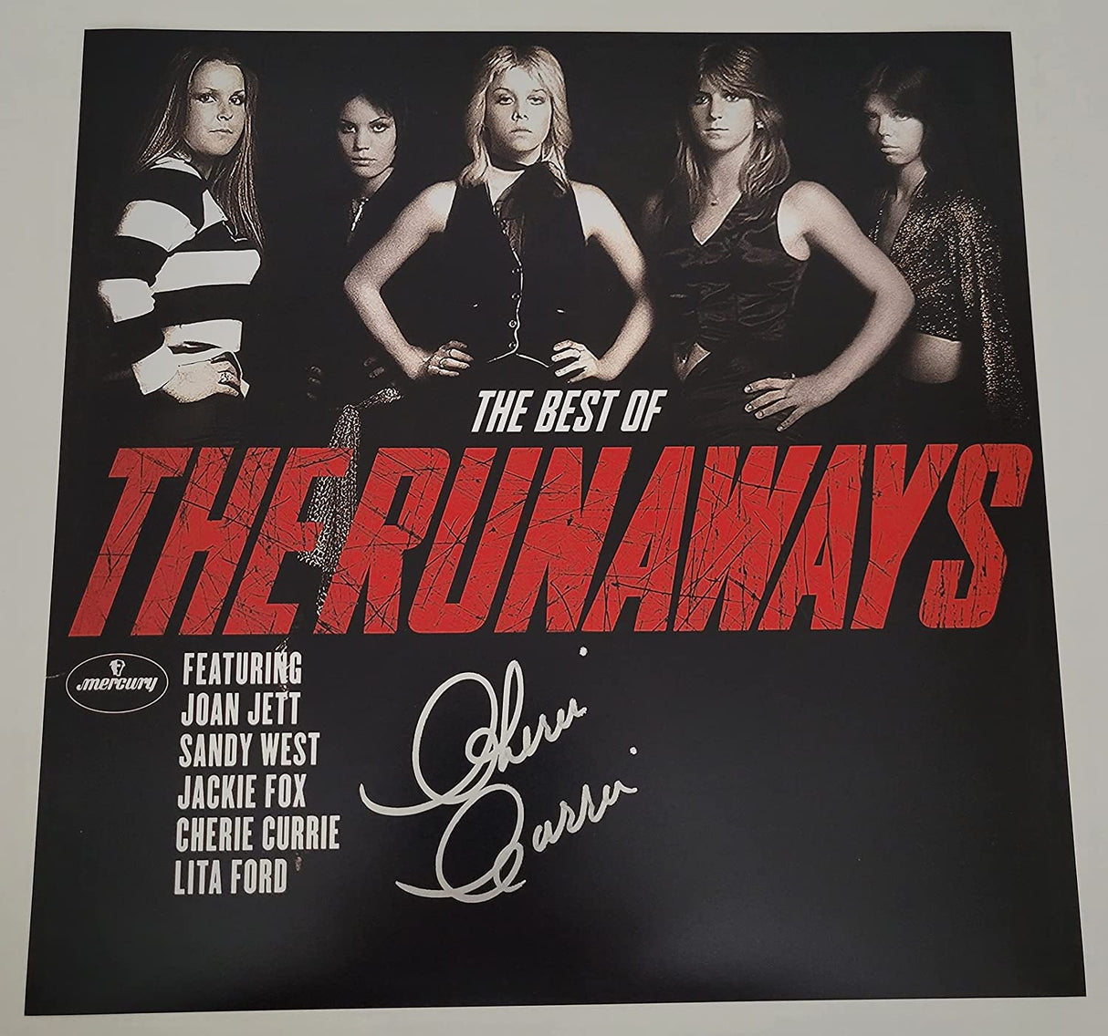 Cherie Currie signed The Best of The Runaways 12x12 album photo COA proof STAR.
