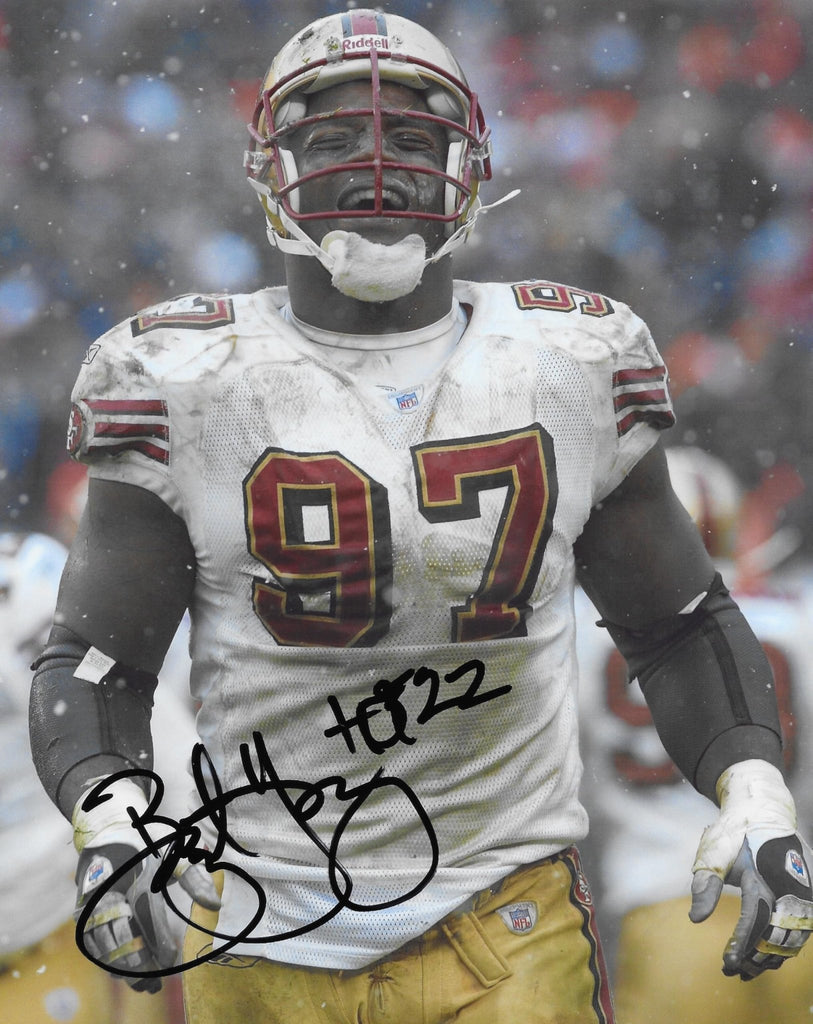 Bryant Young signed San Francisco 49ers football 8x10 photo proof COA autographed.