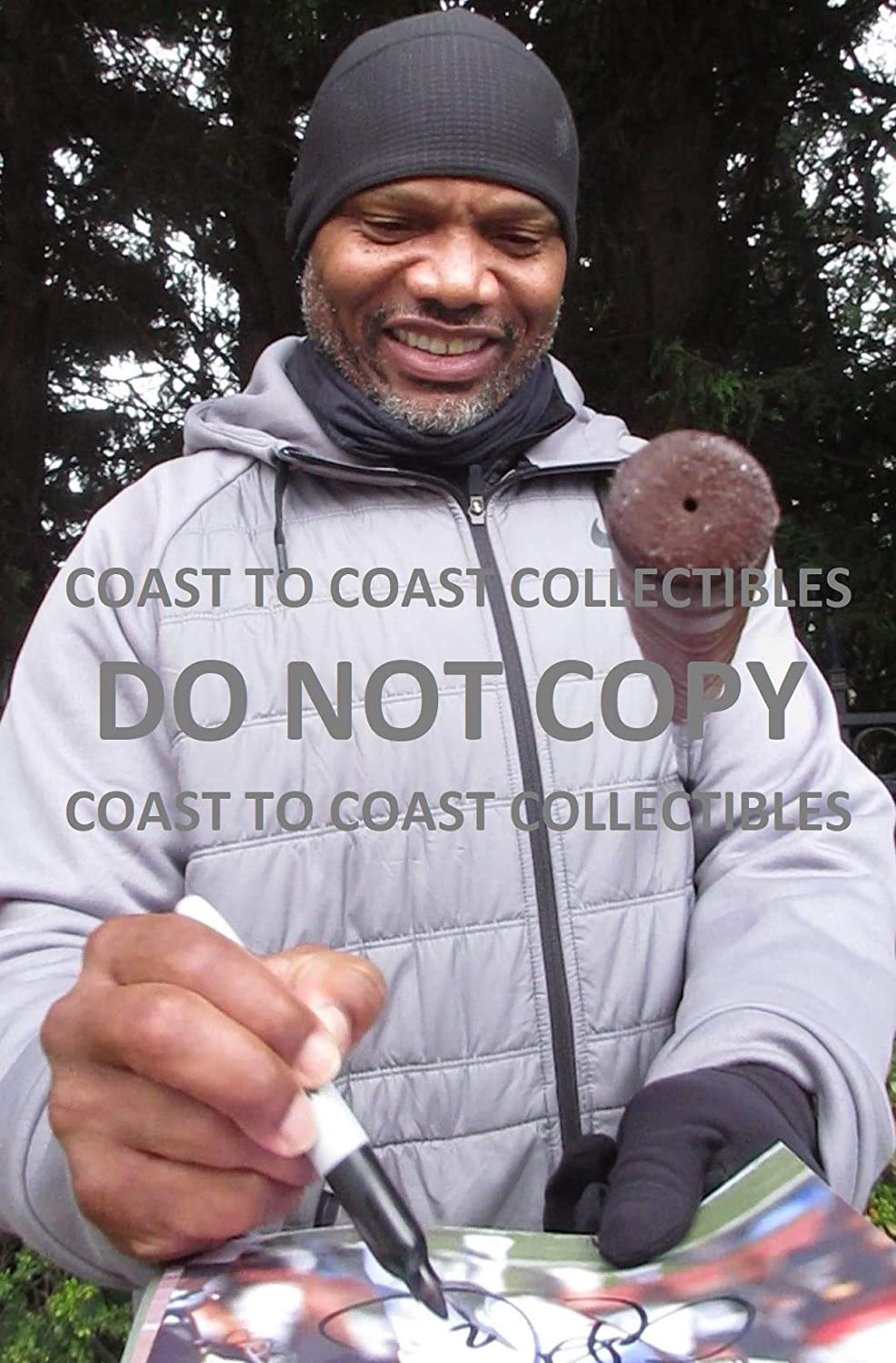 Eric Metcalf autographed Cleveland Browns football 8x10 photo proof COA.