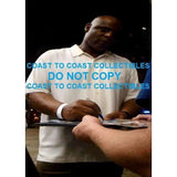 Warren Moon, Houston Oilers, Hall of Fame, Signed, Autographed, 8X10 Photo, a COA with the Proof Photo of Warren Signing Will Be Included.