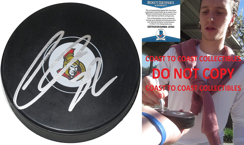Thomas Chabot signed Ottawa Senators logo Hockey puck exact proof Beckett COA