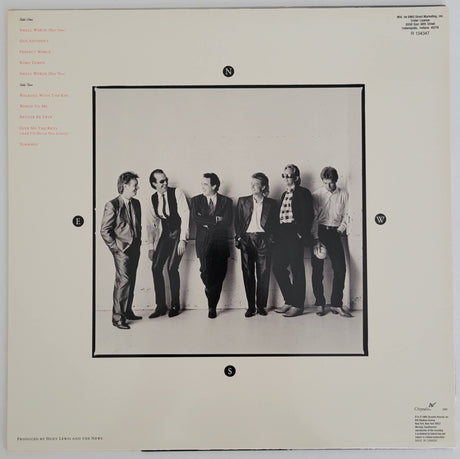 Huey Lewis signed Small World album COA exact proof autographed Vinyl Record STAR