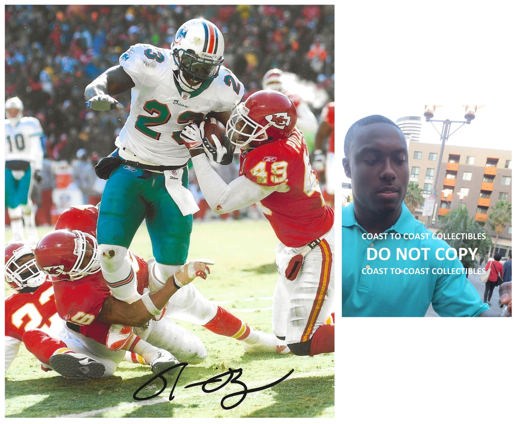 Ronnie Brown signed Miami Dolphins football 8x10 photo Proof COA autographed.