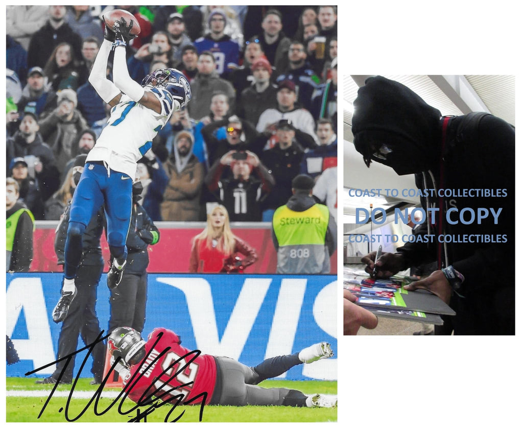Tariq Woolen signed Seattle Seahawks football 8x10 photo proof COA autographed..