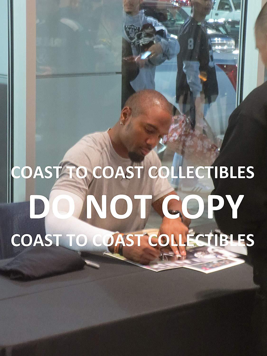 Charles Woodosn Oakland Raiders signed autographed, 8x10 Photo, COA with the proof photo will be included