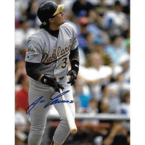 Jose Canseco, Oakland A's, Signed, Autographed, 8X10 Photo, a COA With The Proof Photo of Jose Signing Will Be Included..