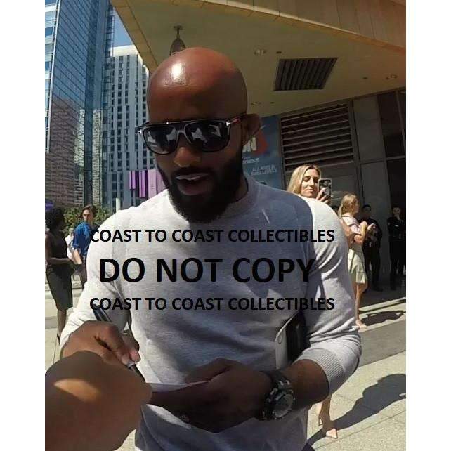 Demetrious Johnson, Mixed Martial Artist, MMA, Signed, Autogrpahed, UFC, 8X10 Photo, a COA with the Proof Photo of Demetrious Signing Will Be Included.