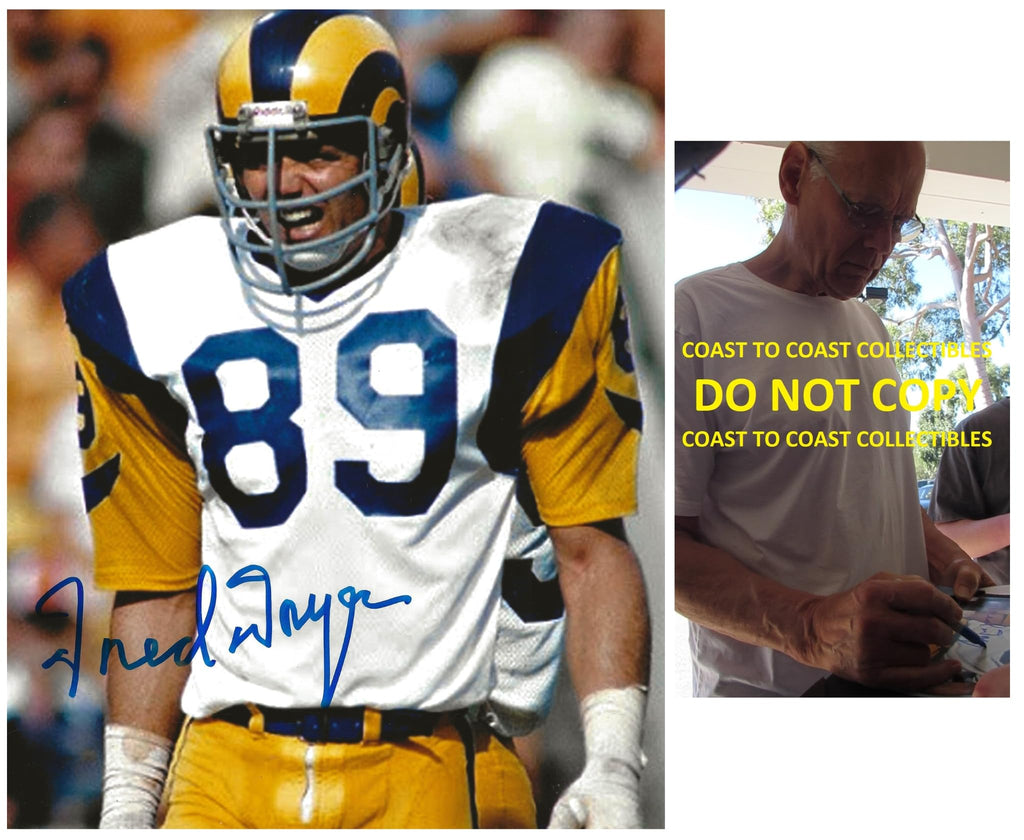 Fred Dryer signed Los Angeles Rams football 8x10 photo Proof COA autographed.