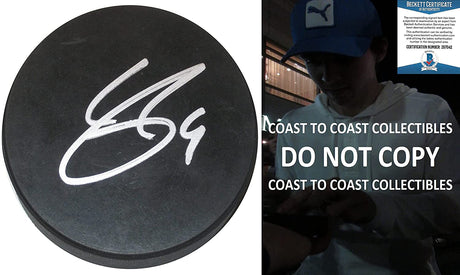 Clayton Keller Arizona Coyotes signed Hockey Puck proof Beckett COA autographed