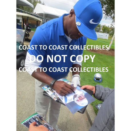 Lawyer Milloy, New England Patriots, Signed, Autographed, 8X10 Photo, a COA with the Proof Photo of Lawyer Signing Will Be Included.