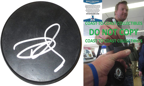 Devan Dubnyk Minnesota Wild Oilers Coyotes signed Hockey puck proof Beckett COA