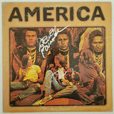 Dewey Bunnell Gerry Beckley signed America album vinyl record COA proof STAR