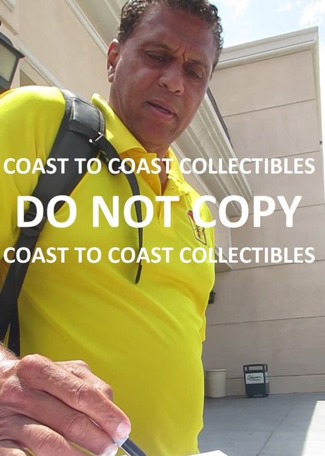 Reggie Theus signed autographed Chicago Bulls 8x10 photo proof Beckett COA